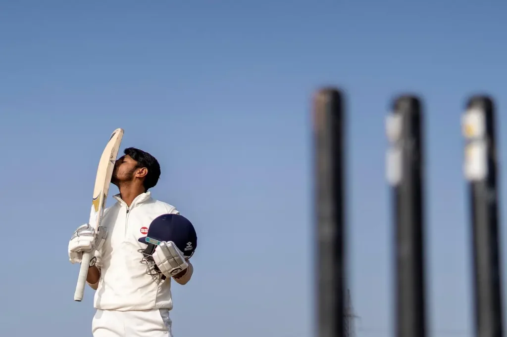 Cricket Player Kissing His Bat